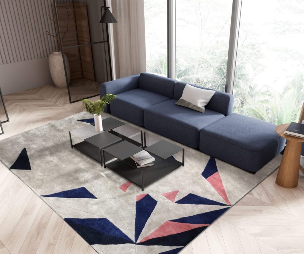 A stylish living room showcasing a bold, geometric patterned rug